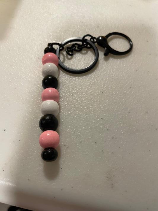 blush and black beaded keychain